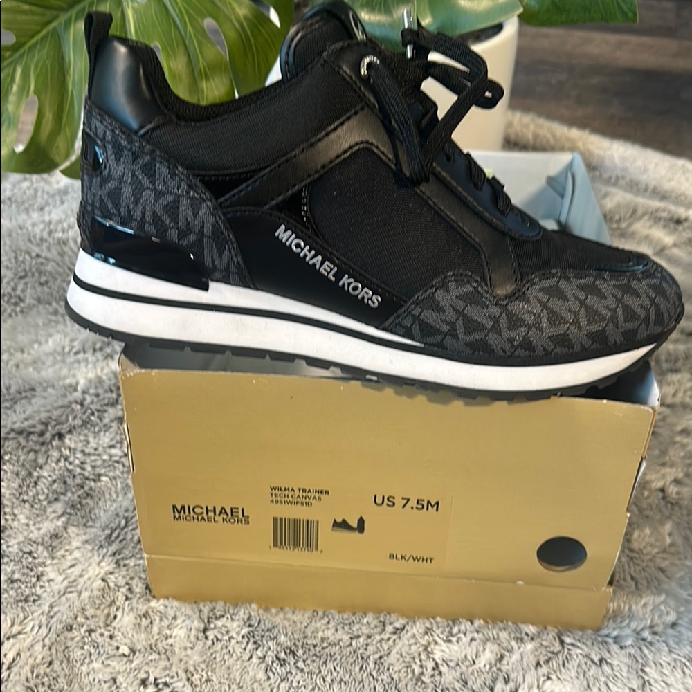 Michael Kors Black Sneakers with Intricate Lace Design